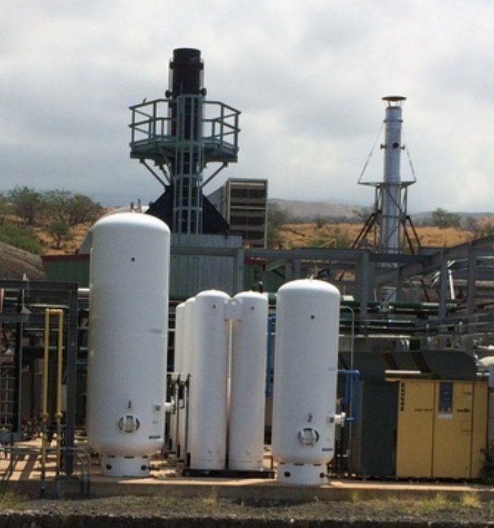 Pressure vessels and pyrolysis flare stacks at the AgEnergy Hawai‘i biochar facility in Kawaihae
